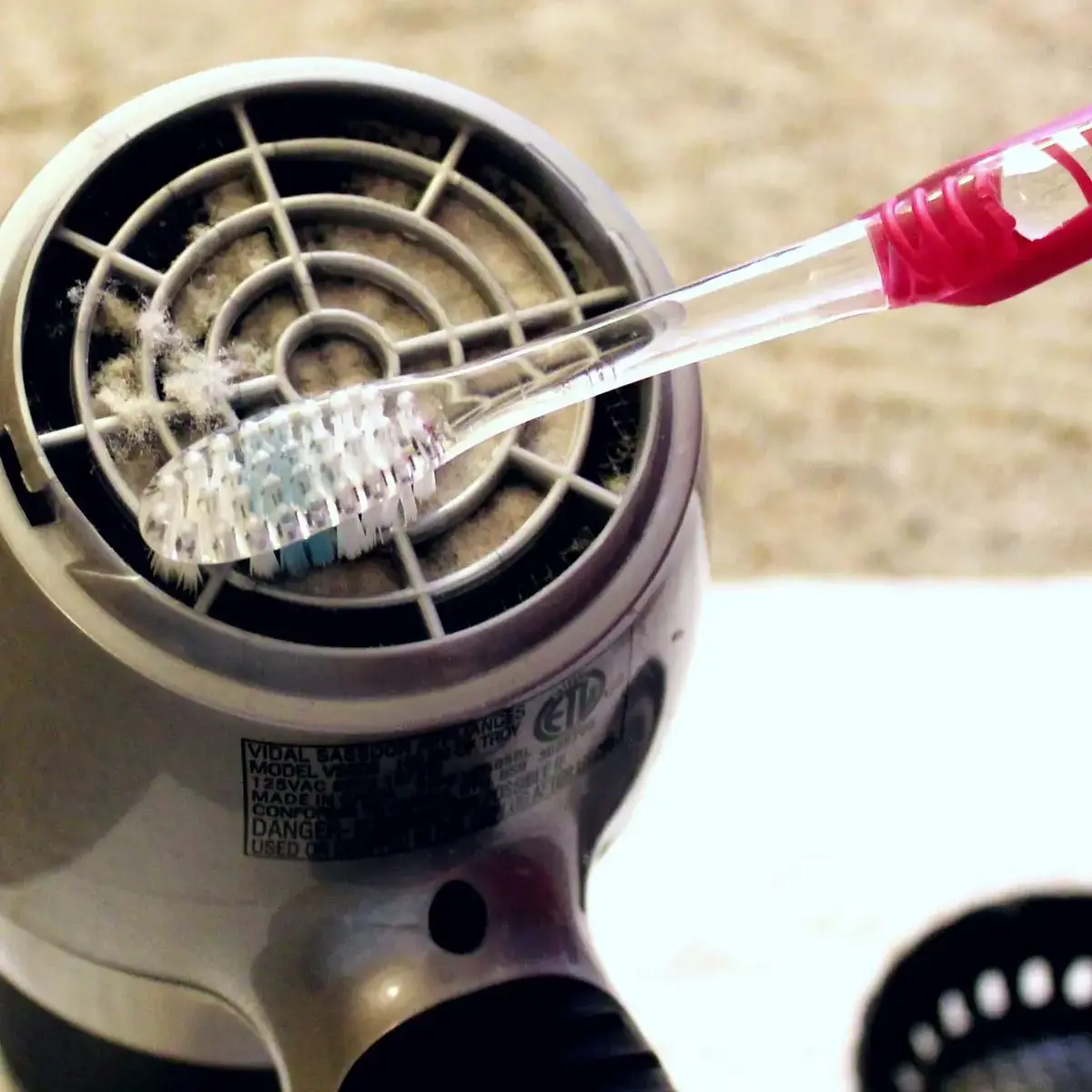 cleaning the filter of a hair dryer